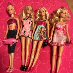 4 clean Barbie dolls